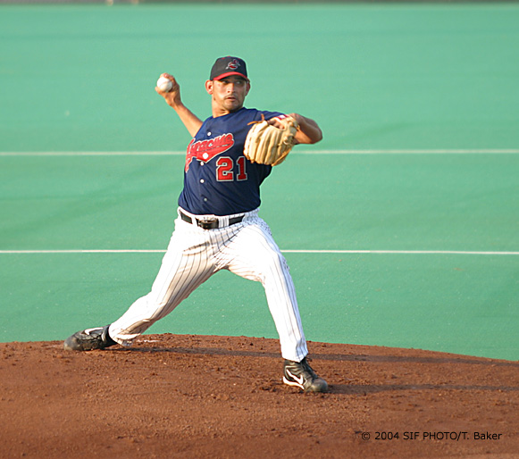 Josue Matos pitches in the early innings of a evening game against the Durham Bulls.