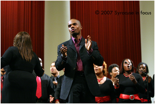 Nov. 10--Gospel recording artist Kirk Franklin performs with Syracuse University's Black Celestial Chorale Ensemble at the African American Male Congress Baccalaureate Ceremony yesterday.