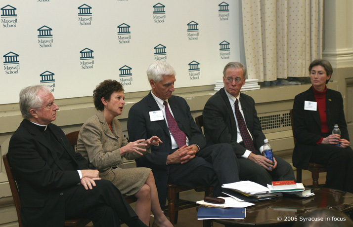 Leaders from five area colleges discussed possible ways to integrate their respective institutions more into city life during a forum called "The Academys Role in Community Development." The forum was held at the Maxwell School on the campus of Syracuse University. Pictured (from left) Fr. Charles Beirne, president of LeMoyne College; Nancy Cantor, chancellor of Syracuse University; Gregory Eastwood, president of SUNY Upstate Medical University; Cornelius B. Murphy, president of SUNY College of Environmental Science and Forestry; and Debbie Sydow, president of Onondaga Community College. 