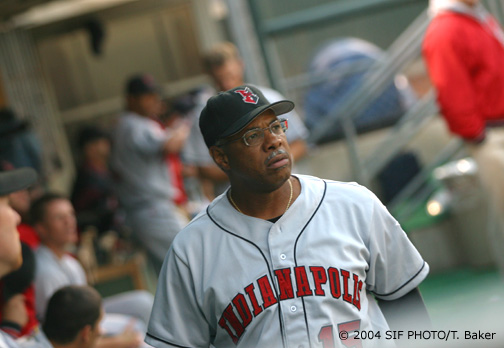 (Pictured) Indianapolis coach and former Brewer Cecil Cooper argues a call for the visitors during a July evening game.