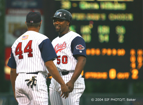 (Pictured) After getting a two-out single in the second innning of Monday night's game against Indianapolis, Carlos Delgago (number 50), talks with SkyChiefs first base coach Ken Landreaux. Syracuse won 6-1.  Delgado is on a rehabilitation assignment from the Toronto Blue Jays and joined the SkyChiefs on Sunday.