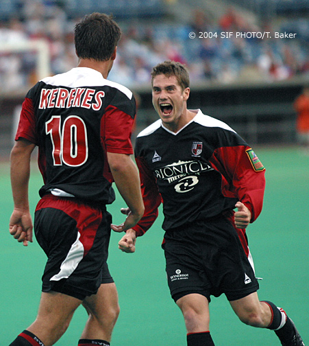 REVERSAL OF FORTUNEJune 14 (SYRACUSE) Salty Dogs Midfielder Tim O'Neil (right) runs to embrace forward Csaba Kerkekes during the second half of yesterday's contest against Virginia Beach.  Kerkekes scored his first goal of the season on an assist from Michel Millwood with 16 mintues remaining.  Syracuse won 1-0.