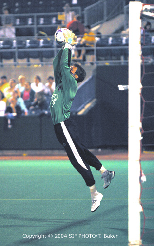 DEFENDING HOME TURF--MAY 15--Syracuse Salty Dogs goalkeeper Paul Nagy leaps to make a save during overtime of the Dogs match against Rochester on Friday.  The defensive struggle between these two Upstate rivals ended in a 1-1 tie, leaving both teams undefeated. Syracuse remains in first place in the A-League's Eastern Conference and will play Rochester next week.