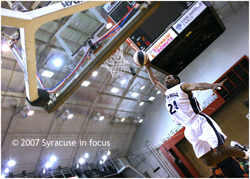 Nov. 9--Soaring--Syracuse Guard Marlin Johnson skies for a dunk in the 4th quarter of last nights Bullz win against the Houston Takers.  The Bullz won 100-71.