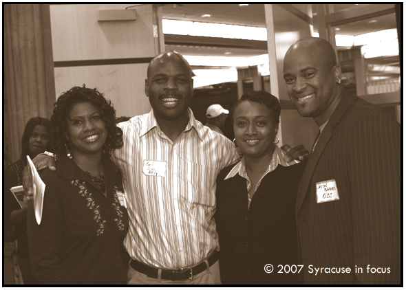 July 21--(SYRACUSE) Network at National Grid--Monique Frost, Karl and Marilyn Sims and Jason Barnes relax at the latest Syra-Soul Business and Professional Networking (SBPN) Event held Thursday at National Grid's Headquarters.