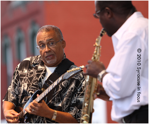 Urban Jazz Collective's Duane Tribune (left) and Richard Randolph play on stage in Little Italy