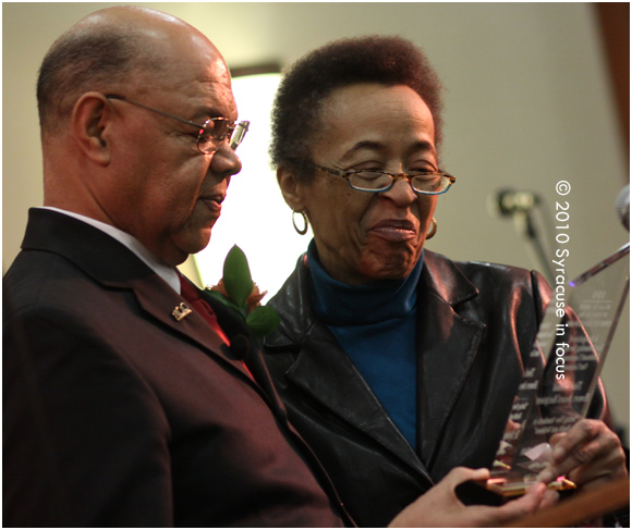 Charles Anderson presenting an award to Dr. Sylvia Norton