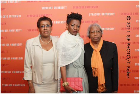 Designer Syreeta Chantal Herbert (center) with her family in New York. Herbert's designs were featured in the 2011 Gala on Thursday.