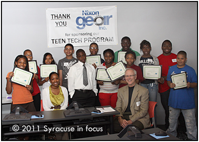 Teen Tech graduates with class sponsor Sam Haines (front right) and class instructor Natisha Crossman (front left)