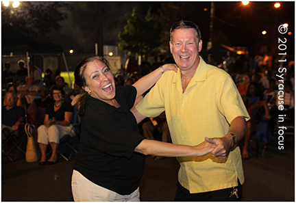 La Liga's Rita Paniagua and CNYJAF's Larry Luttinger Dance on Oswego Street