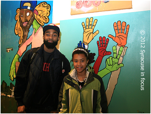 Brother Mars and Chenoa Baker at the Salon Art Show at the Syracuse Tech Garden.