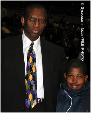 NBA Hall of Famer Earl Lloyd visits with Aaron Allen at the War Memorial in 2000.