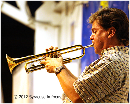 Paul Merill on stage with the CNY Jazz Orchestra