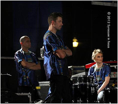 Members of the band watch as Kellerman performs a solo