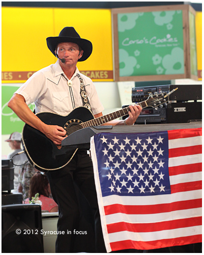 Matthew Chase, sings in the Dairy Building at the NYS Fair