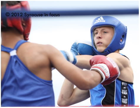 Jordan Adamson of St. Catherines Ontario (Canada) prepares to throw an overhand right during his bout.