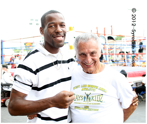 Boxer Ryon McKenzie and Trainer Ray Rinaldi enjoy the fights at the NYS Fair (outside the Colesium).