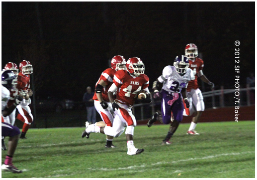 JD Runningback Rasheed Baker breaks away in the first quarter.