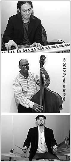 Bill Horrace Trio (Carroll, Horrace, Dekaney) play at the retirement celebration for journalist Jackie Robinson at the Pirro Convention Center.