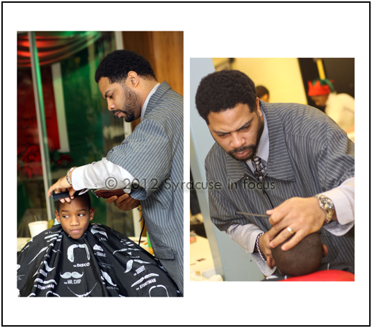 Ed Perry, owner E-Clipz Barbershop, works at the Cut-A-Thon on Wednesday.