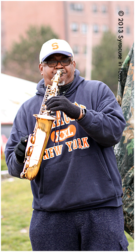 C. Robinson, aka the Saxman, serenaded fans on their way to the Dome today.