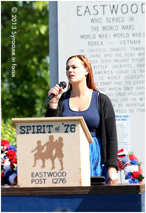 Amanda Marzullo sings after the Eastwood Memorial Day Parade