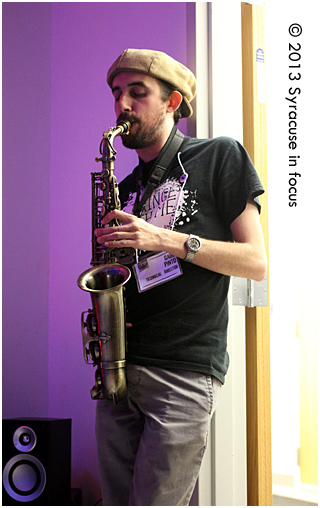 Fringe Technical Director Gabriel Pinto occupies Saturday night with a sax solo.