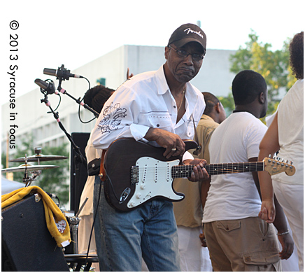 Guitarist Jeff Houston dances while sitting in for the United Praise set