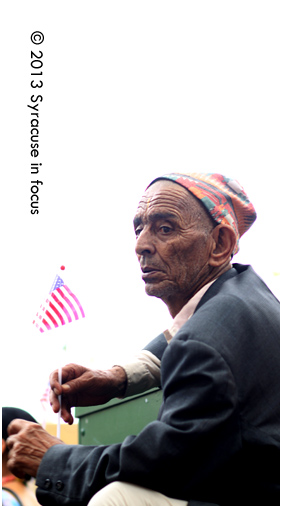 I too sing America: An elder checks out the stage show in Hanover Square