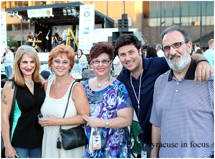 Smooth Sax artist Al Cutri (second from right) comes from a family of talented musicians. He took time to chill with his family after playing a white hot set with his band Blowin' in the Wind on the opening day of the Northeast Jazz & Wine Festival (Clinton Square).