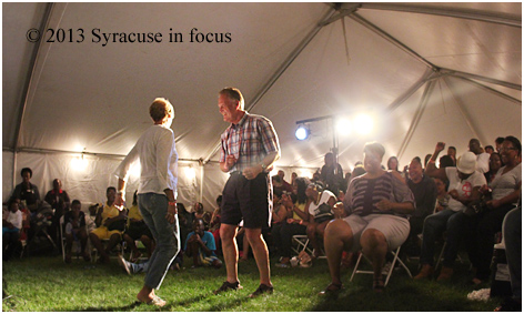 A couple dances during the final set for the band Brownskin on Friday.