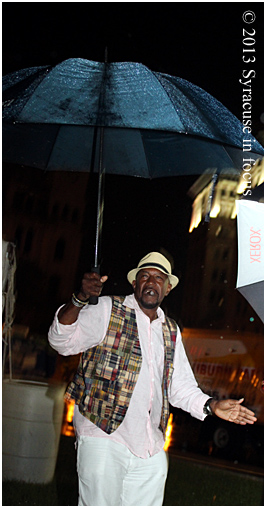 Blame it on the Rain: A die-hard fan dances to a rendition of Mr. Magic by the All-Star Jam Session Band.