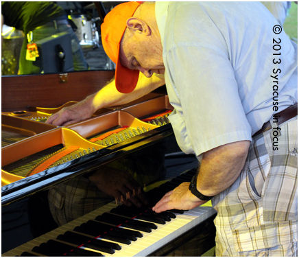 Piano Tuner Kenny Williams has been working festivals and concerts in Syracuse for more than a half century.