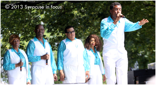 The 5th Dimension brought back good memories during yesterday's New York State Fair performance. The group consists of (from left to right) Patrice Morris, Floyd Smith, Willie Williams, (original member) Florence LaRue and Leonard Tucker. Tucker sings here from their hit "Wedding Bell Blues."