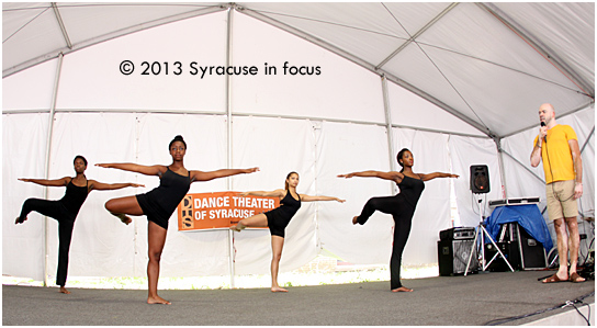 Members of the Dance Theater of Syracuse, under the direction of Brandon Ellis, showed some of their warm-up routine at the Pan-African Village on Friday.