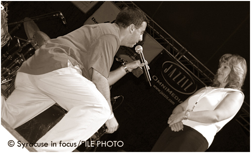 WAER Radio Announcer Eric Cohen proposes to his fiance in 2005 during a Jazz in Square show.