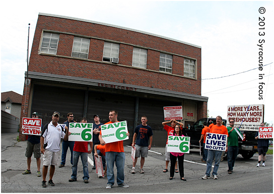 Firehouse advocates and supporters of Pat Hogan rally to get out the vote on East Fayette Street on Monday.