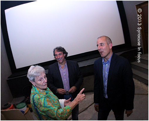 Paul Kentoffio and Basil Anastassiou meet with supporters after a screening of their film in Manlius on Friday.