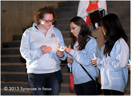 SU Senior and Remembrance Scholar Erin Carhart (left) helped her