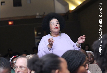 Poet Jackie Warren-Moore asks her question for the panel.