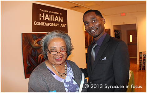 TV Host Vicky Brakens with panelist Rickey Brown