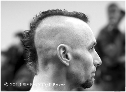 The Mohawk hairstyle has numerous varieties, but its origins date back thousands of years. We saw this freshly quaffed version during a martial arts tournament.