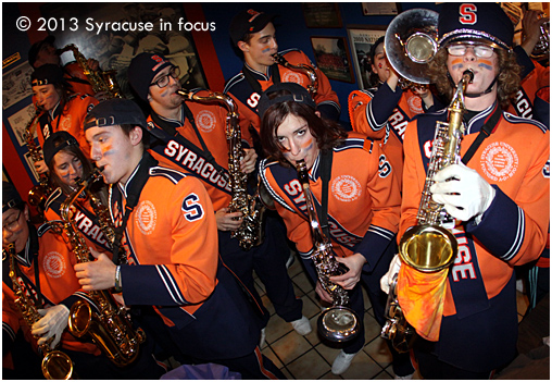 The Syracuse University Football Team became bowl eligible after Saturday's final minute, 34-31 win over Boston College. The party continued when the marching band played inside Varsity Pizza.