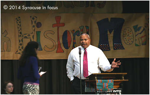 Crossfire: Assemblyman Sam Roberts remains cool while he gets grilled by a student.