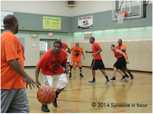 Don Crouch (center) and Flav's Unit turned up their man-to-man defense pressure to close the gap in the second half.