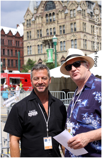 Band leader and sax player Dave Frateschi and Journalist Russ Tarby at the Battle of the Community Bands in Clinton Square.