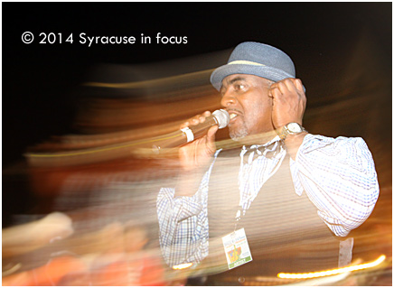 Mike Houston sings his way through the crowd to close out Day 1 of the Northeast Jazz and Wine Festival last night.