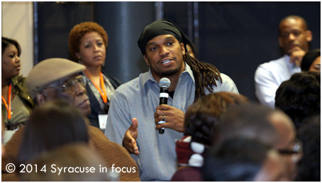 Etan Thomas talks about reaching not only his own children but those in the community as well (seated to his right was former SU player Manny Breland).