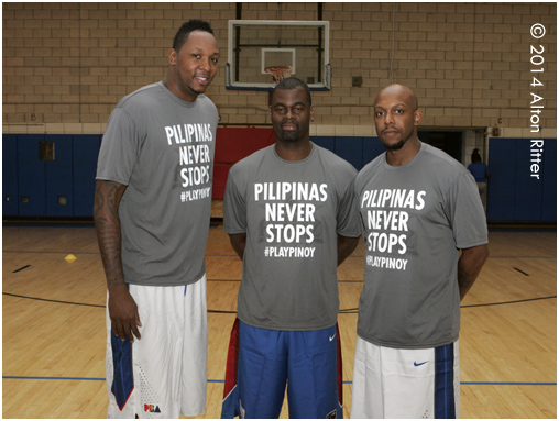 Former Henninger High star Marcus Douthit (left) along with former UConn Huskie Taliek Brown (right) participated in a free basketball clinic for Filipino youth in Queens on Columbus Day. The clinic was hosted by Footprintz and training pro Mark Williams. 