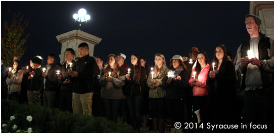 Students joined the vigil at the Wall of Remembrance.